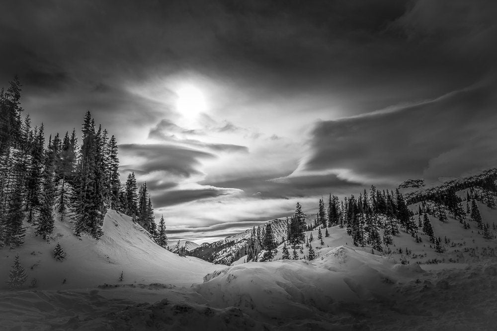 Snowy stormy sky near Ouray and Silverton Colorado. Dramatic black and white mountain landscape photo. Available in prints or canvas. Offered by original photographer.