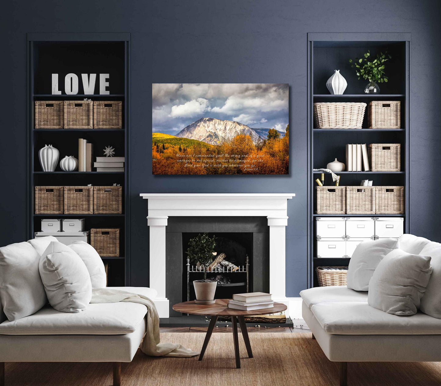 Beautiful snowy mountain peak rising above colorful fall aspens in Colorado. Scripture verse Joshua 1:9, Shown in mockup version with navy walls and white furniture.