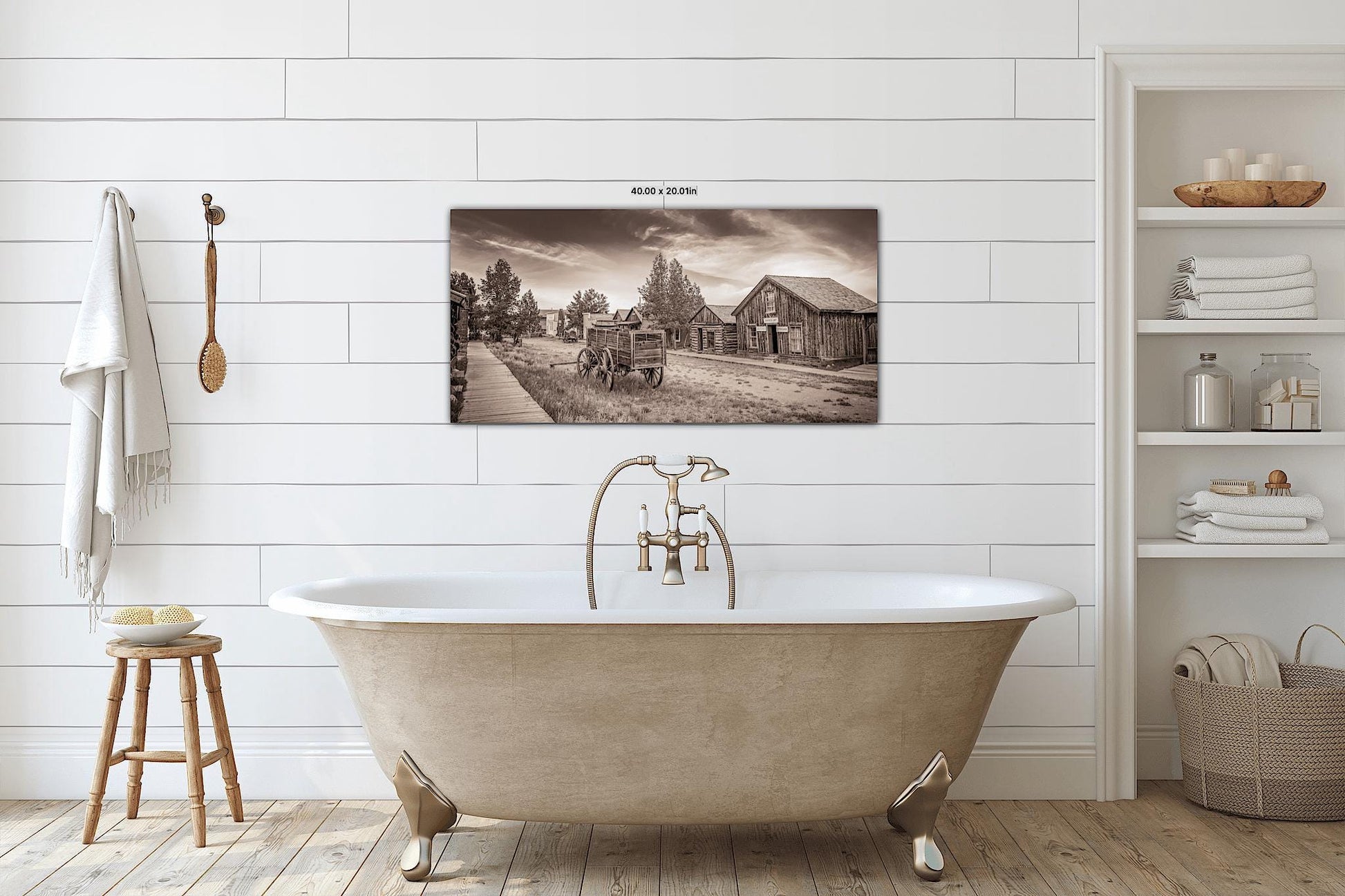 Old west town in Colorado print in sepia black and white. Mockup shown in canvas above antique tub.