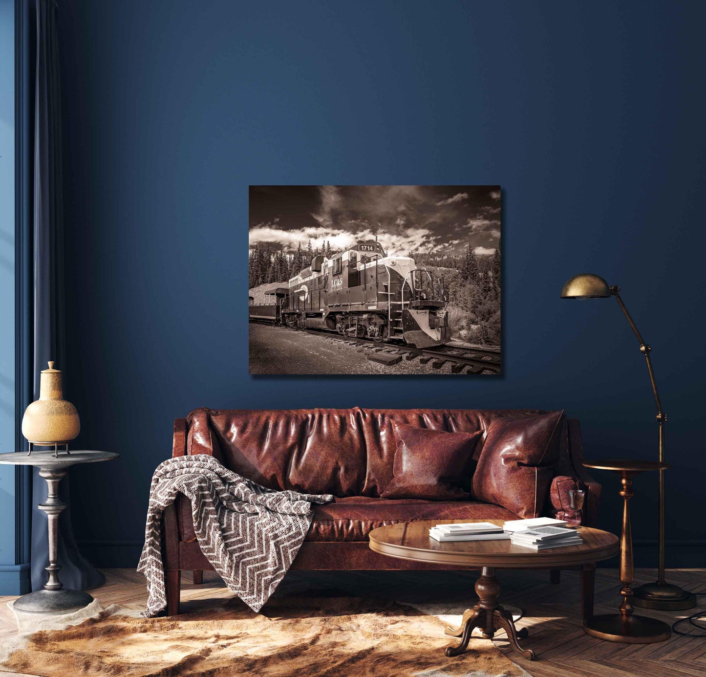 Old train on tracks in the mountains in Colorado in sepia or black and white. Mockup showing canvas option.