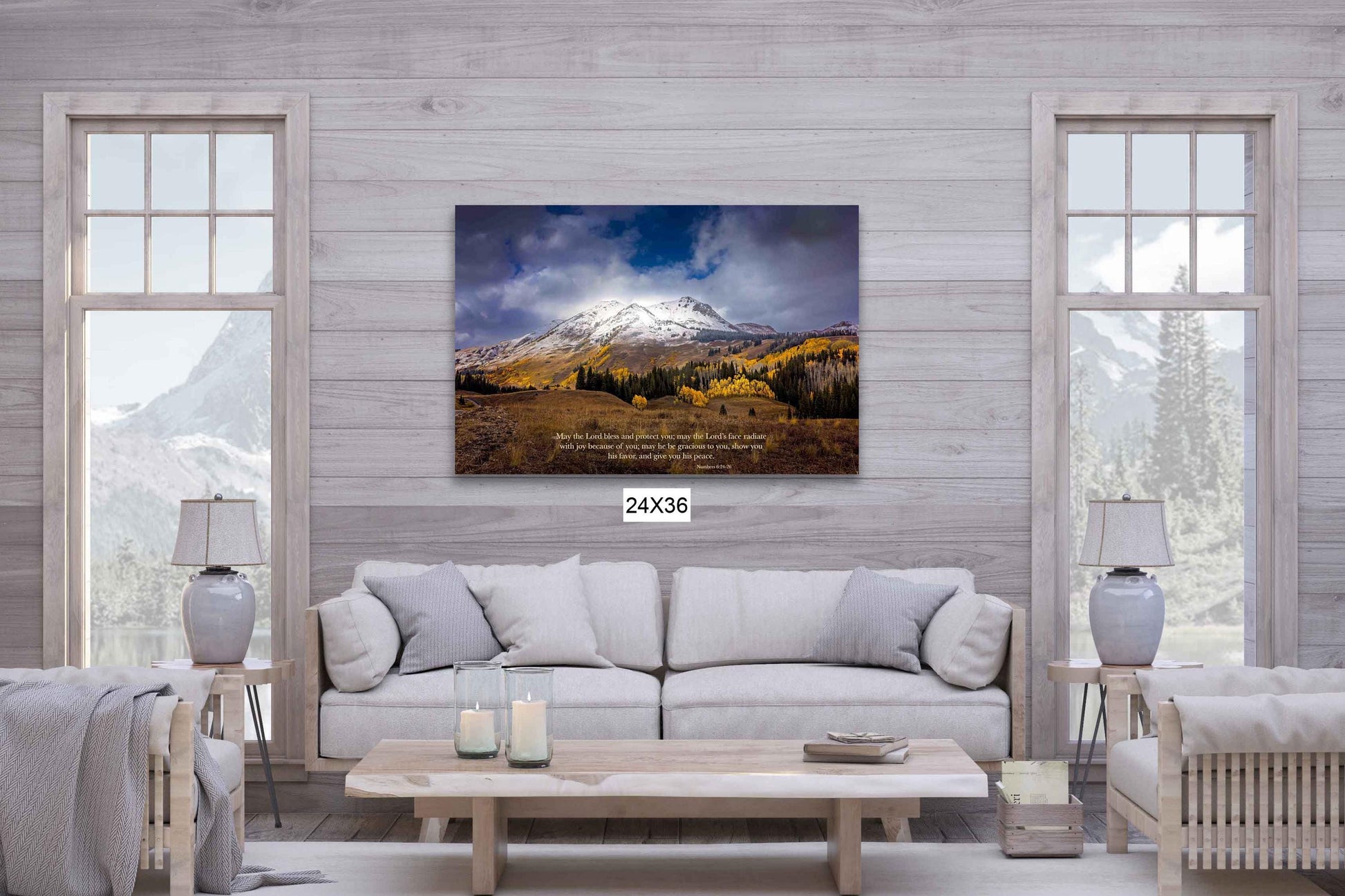 Numbers 6:24-26 verse on background of snowy mountain peak soaring over golden fall aspens in Colorado. Photo shows image printed on canvas. in a light wood room